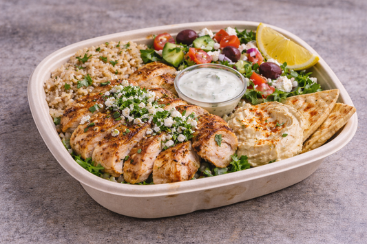 Greek lemon chicken bowl with pita bread
